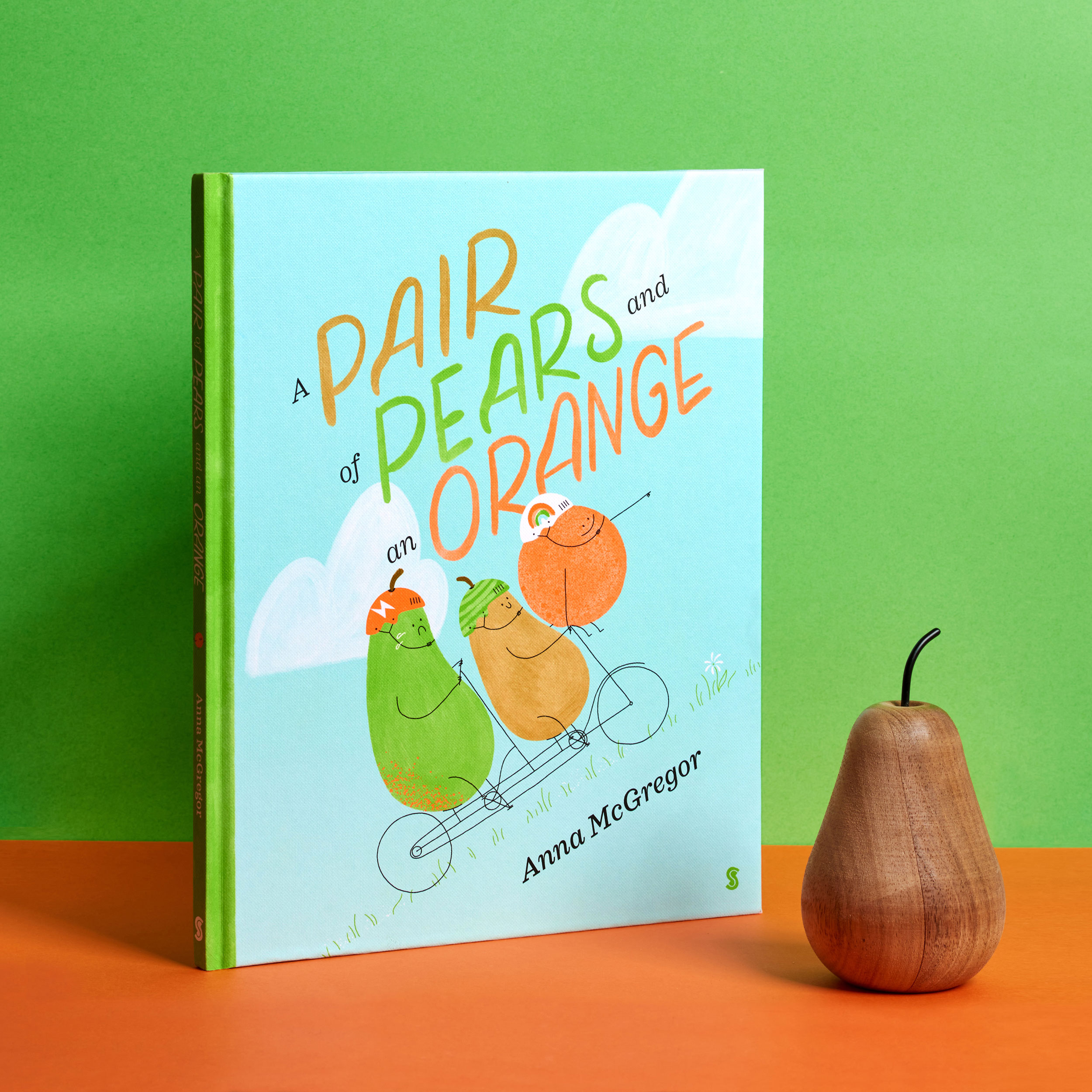 A Pair of Pears and an Orange Book Cover